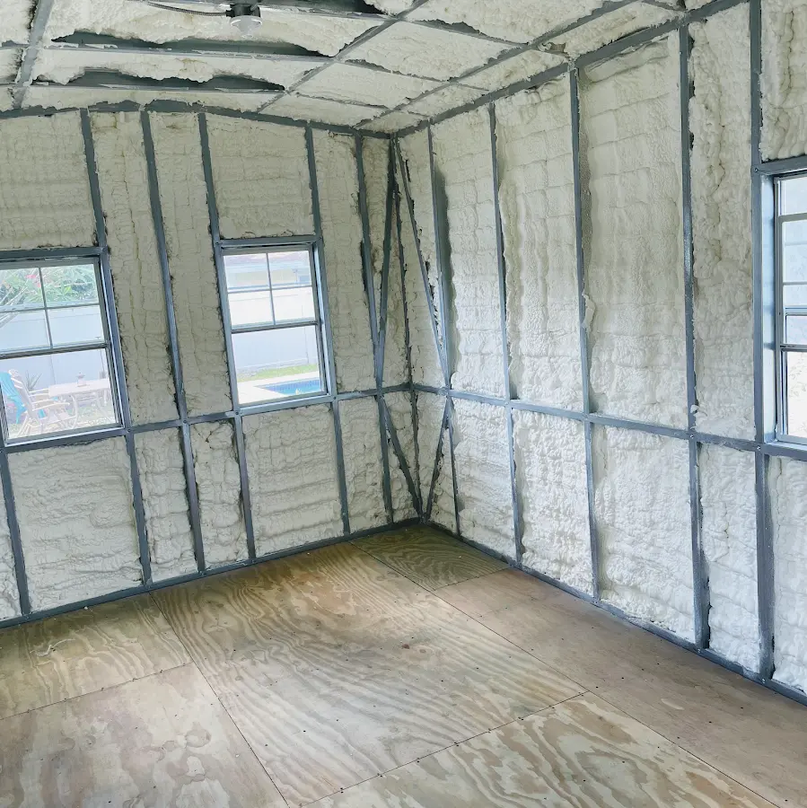 Closed-cell spray foam insulation applied to wall cavities in a residential project in Bordentown